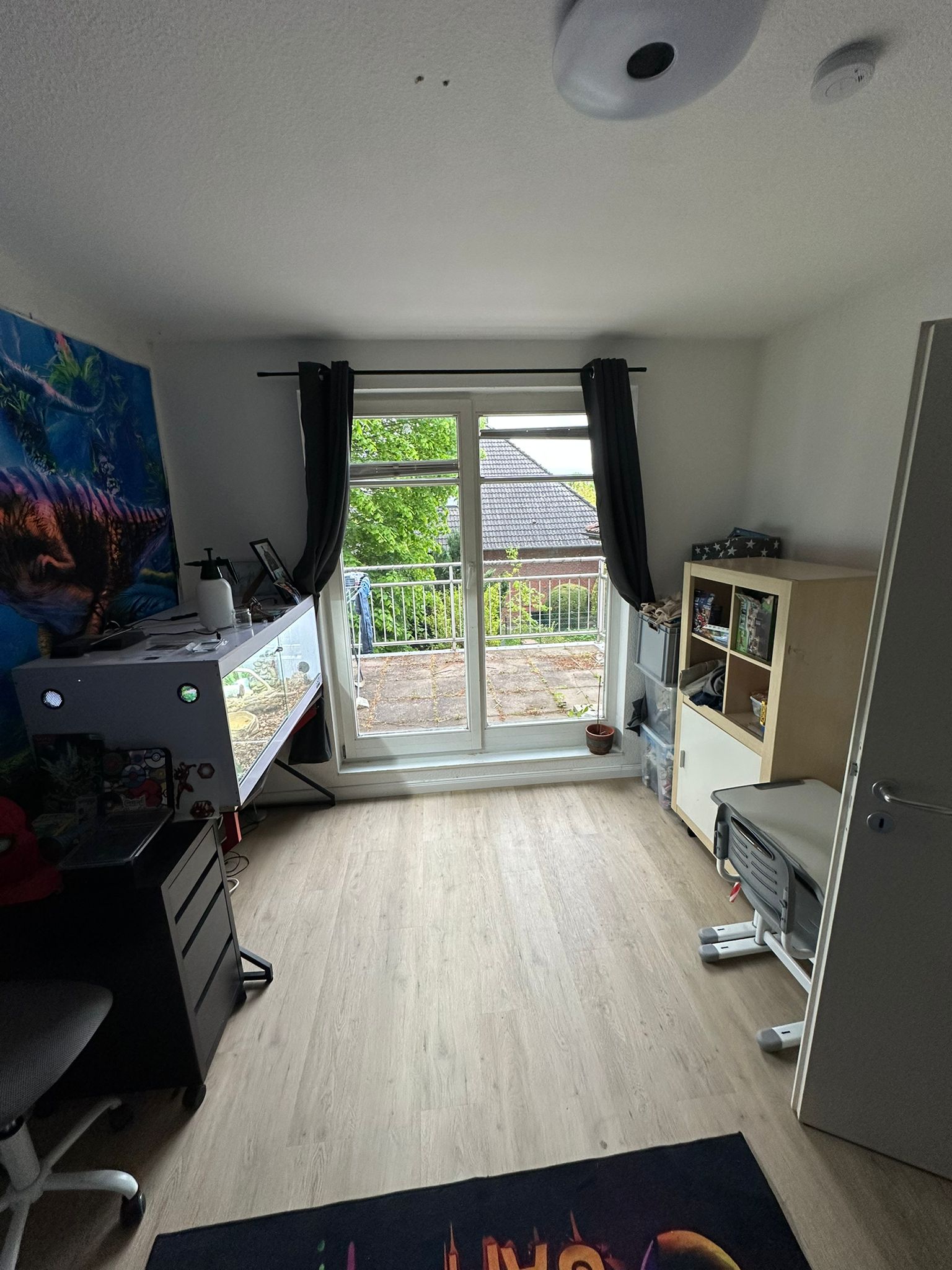 Schlafzimmer mit Balkonzugang